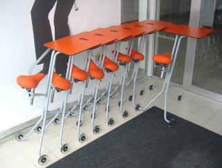 Illustration for article titled Scooterdesk to Open New Office Chair Racing Era